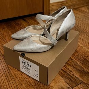 Never worn, size 9.5 silver heels
